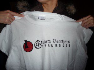 Grimm Brothers A friend displays a Grimm Brothers Brewhouse t-shirt. Photo by H.M. Kerr-Schlaefer