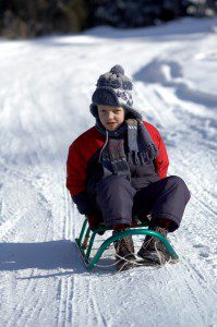 boy on sled boy on sled