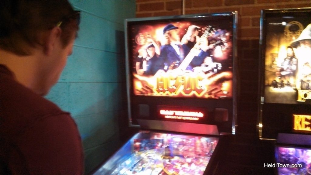 playing pinball at Punch Bowl Social in Denver, Colorado. HeidiTown.com playing pinball at Punch Bowl Social in Denver, Colorado. HeidiTown.com