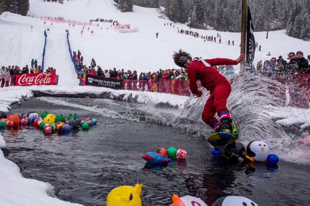 Spring slopeside festivals in Colorado. Pond skimming in Winter Park