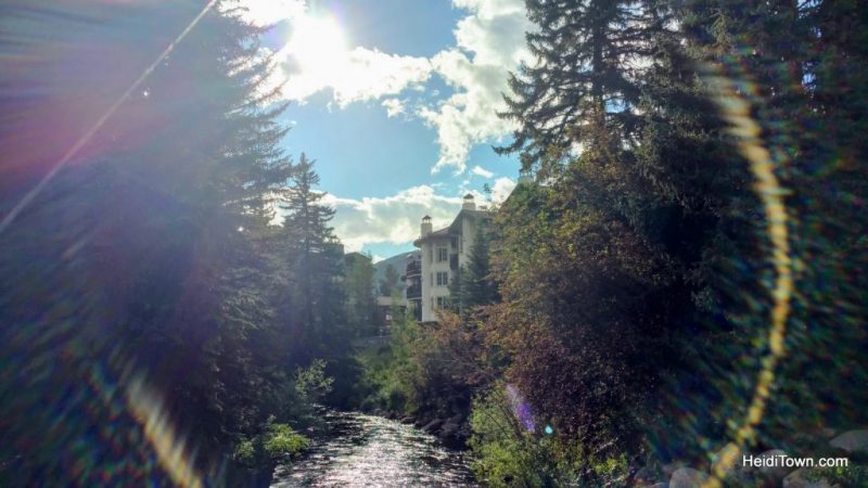 5 Picture Perfect Colorado Summer Towns, a sundog in Vail over Gore Creek. HeidiTown.com